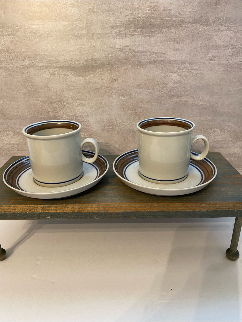 Cream Ceramic Cup and Saucer Set of Two with Brown and Blue Accent